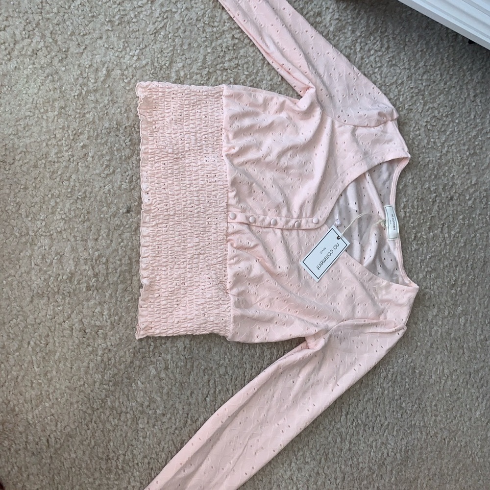 light pink sweater with buttons